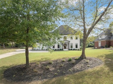 Absolutely stunning two-story home situated on the 6th fairway on Royal Lakes Golf and Country Club in Georgia - for sale on GolfHomes.com, golf home, golf lot