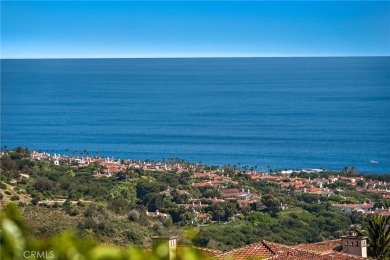 Indulge in elegant coastal living at this opulent ocean-view on Pelican Hill Golf Club in California - for sale on GolfHomes.com, golf home, golf lot