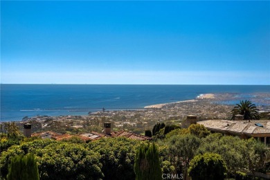 Indulge in elegant coastal living at this opulent ocean-view on Pelican Hill Golf Club in California - for sale on GolfHomes.com, golf home, golf lot