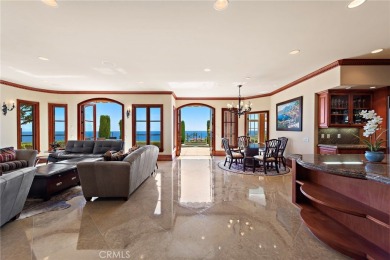 Indulge in elegant coastal living at this opulent ocean-view on Pelican Hill Golf Club in California - for sale on GolfHomes.com, golf home, golf lot