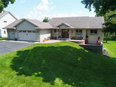 Discover luxurious living in this stunning 5-bedroom, 4-bathroom on Geneva Golf Club in Minnesota - for sale on GolfHomes.com, golf home, golf lot