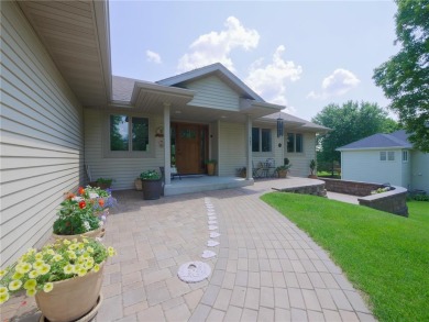 Discover luxurious living in this stunning 5-bedroom, 4-bathroom on Geneva Golf Club in Minnesota - for sale on GolfHomes.com, golf home, golf lot