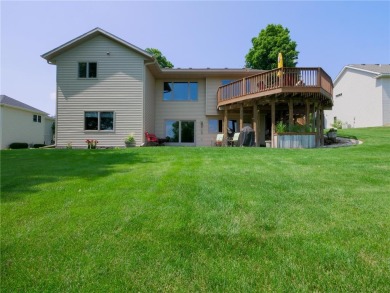 Discover luxurious living in this stunning 5-bedroom, 4-bathroom on Geneva Golf Club in Minnesota - for sale on GolfHomes.com, golf home, golf lot