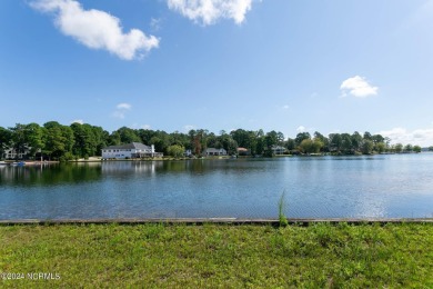 Gorgeous waterfront lot in highly desirable 7LW community. Lot on Beacon Ridge Golf and Country Club in North Carolina - for sale on GolfHomes.com, golf home, golf lot