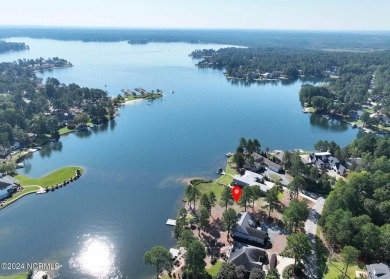 Gorgeous waterfront lot in highly desirable 7LW community. Lot on Beacon Ridge Golf and Country Club in North Carolina - for sale on GolfHomes.com, golf home, golf lot