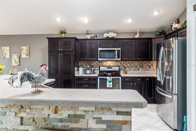 Immaculately maintained and beautifuly appointed best describes on Pennbrooke Fairways in Florida - for sale on GolfHomes.com, golf home, golf lot