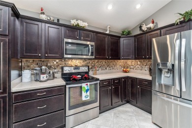 Immaculately maintained and beautifuly appointed best describes on Pennbrooke Fairways in Florida - for sale on GolfHomes.com, golf home, golf lot