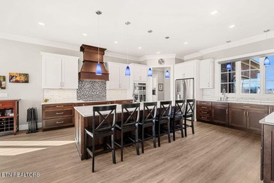 Luxury home for sale in Windriver with gorgeous views of Tellico on Wind River Golf Course in Tennessee - for sale on GolfHomes.com, golf home, golf lot