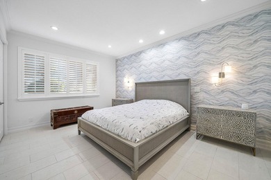 Updated first floor condo available in the desirable community on BallenIsles Golf and Country Club in Florida - for sale on GolfHomes.com, golf home, golf lot