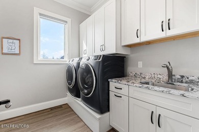 Luxury home for sale in WindRiver with gorgeous views of Tellico on Wind River Golf Course in Tennessee - for sale on GolfHomes.com, golf home, golf lot