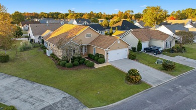 Welcome to this charming 3-bedroom, 2-bath home with bonus room on Heron Point Golf Club in South Carolina - for sale on GolfHomes.com, golf home, golf lot