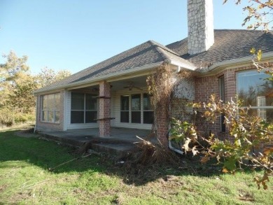 Acreage? YUP! Home is nestled on a cul de sac with over an acre on Eagle Mountain Country Club  in Texas - for sale on GolfHomes.com, golf home, golf lot