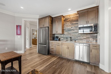 Luxury home for sale in WindRiver with gorgeous views of Tellico on Wind River Golf Course in Tennessee - for sale on GolfHomes.com, golf home, golf lot