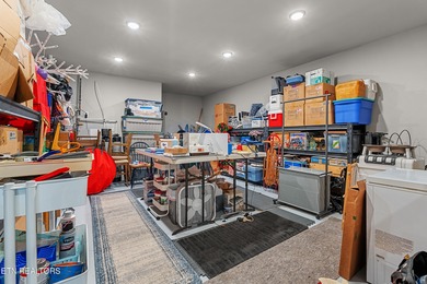 Luxury home for sale in WindRiver with gorgeous views of Tellico on Wind River Golf Course in Tennessee - for sale on GolfHomes.com, golf home, golf lot