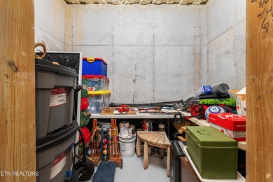 Luxury home for sale in WindRiver with gorgeous views of Tellico on Wind River Golf Course in Tennessee - for sale on GolfHomes.com, golf home, golf lot