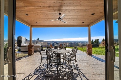 Luxury home for sale in WindRiver with gorgeous views of Tellico on Wind River Golf Course in Tennessee - for sale on GolfHomes.com, golf home, golf lot