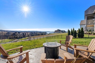 Luxury home for sale in WindRiver with gorgeous views of Tellico on Wind River Golf Course in Tennessee - for sale on GolfHomes.com, golf home, golf lot