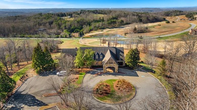 Luxury home for sale in WindRiver with gorgeous views of Tellico on Wind River Golf Course in Tennessee - for sale on GolfHomes.com, golf home, golf lot