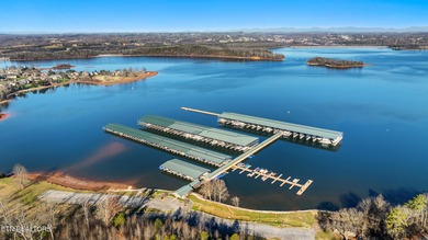 Luxury home for sale in WindRiver with gorgeous views of Tellico on Wind River Golf Course in Tennessee - for sale on GolfHomes.com, golf home, golf lot