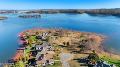 Luxury home for sale in WindRiver with gorgeous views of Tellico on Wind River Golf Course in Tennessee - for sale on GolfHomes.com, golf home, golf lot