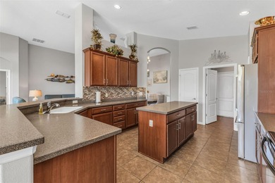 SPECTACULAR ASHTON floor plan with 2 1/2 car garage - large on Kings Gate Golf Club in Florida - for sale on GolfHomes.com, golf home, golf lot