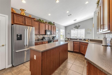 SPECTACULAR ASHTON floor plan with 2 1/2 car garage - large on Kings Gate Golf Club in Florida - for sale on GolfHomes.com, golf home, golf lot