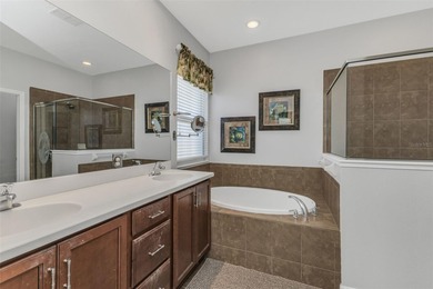 SPECTACULAR ASHTON floor plan with 2 1/2 car garage - large on Kings Gate Golf Club in Florida - for sale on GolfHomes.com, golf home, golf lot