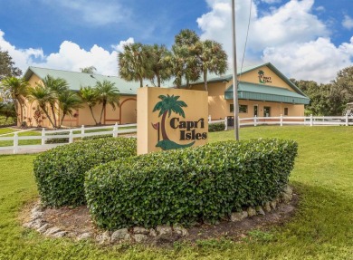 GROUND FLOOR! TURNKEY! 1 CAR GARAGE! This well-maintained ground on Capri Isle Golf Club in Florida - for sale on GolfHomes.com, golf home, golf lot