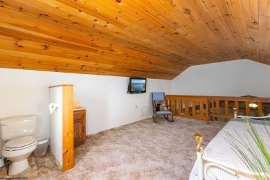 Welcome to 'Faber's Loft', a charming and nostalgic 3 bedroom on Alpine Lake Resort in West Virginia - for sale on GolfHomes.com, golf home, golf lot