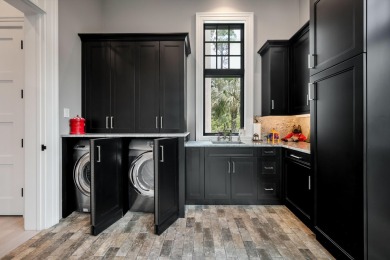 This exceptional 5,262-square-foot residence in the on Cassique Golf Club in South Carolina - for sale on GolfHomes.com, golf home, golf lot