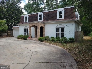 Beautiful spacious fixer upper in the heart of Buckhead.  This on Bobby Jones Golf Club in Georgia - for sale on GolfHomes.com, golf home, golf lot