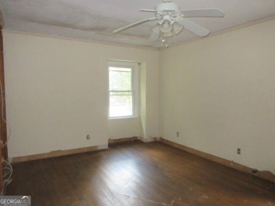Beautiful spacious fixer upper in the heart of Buckhead.  This on Bobby Jones Golf Club in Georgia - for sale on GolfHomes.com, golf home, golf lot