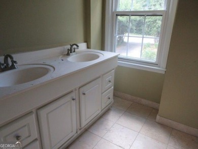 Beautiful spacious fixer upper in the heart of Buckhead.  This on Bobby Jones Golf Club in Georgia - for sale on GolfHomes.com, golf home, golf lot