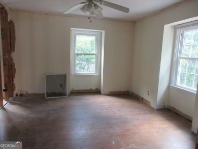 Beautiful spacious fixer upper in the heart of Buckhead.  This on Bobby Jones Golf Club in Georgia - for sale on GolfHomes.com, golf home, golf lot