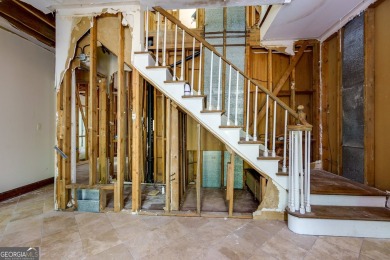 Beautiful spacious fixer upper in the heart of Buckhead.  This on Bobby Jones Golf Club in Georgia - for sale on GolfHomes.com, golf home, golf lot