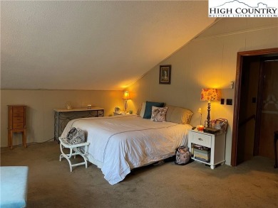 Located in the highly sought-after Linville Land Harbor, this on Land Harbor Golf Course in North Carolina - for sale on GolfHomes.com, golf home, golf lot