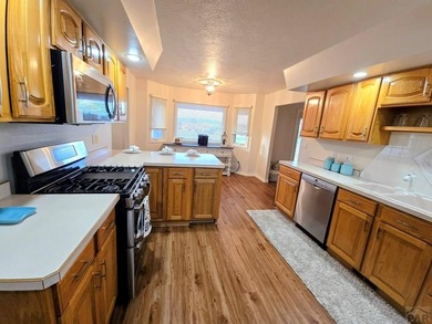 Beautiful, spacious home located at the 7th and 8th hole of on Desert Hawk At Pueblo West in Colorado - for sale on GolfHomes.com, golf home, golf lot