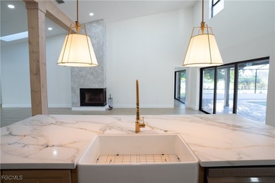 Step inside this freshly remodeled 3-bed, 2-bath pool home with on The Forest Country Club in Florida - for sale on GolfHomes.com, golf home, golf lot