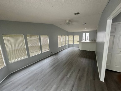 Beautifully renovated 2 bedroom, 2 bathroom home.  The home is on Del Tura Golf and Country Club in Florida - for sale on GolfHomes.com, golf home, golf lot