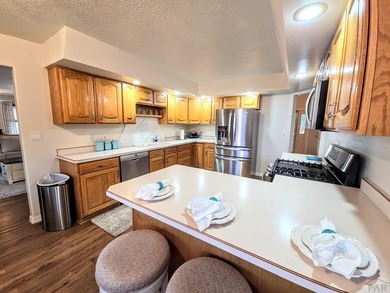 Beautiful, spacious home located at the 7th and 8th hole of on Desert Hawk At Pueblo West in Colorado - for sale on GolfHomes.com, golf home, golf lot