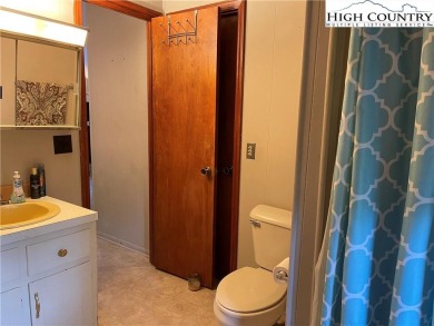 Located in the highly sought-after Linville Land Harbor, this on Land Harbor Golf Course in North Carolina - for sale on GolfHomes.com, golf home, golf lot