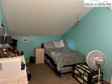 Located in the highly sought-after Linville Land Harbor, this on Land Harbor Golf Course in North Carolina - for sale on GolfHomes.com, golf home, golf lot