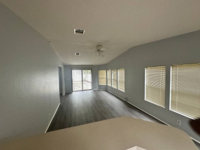 Beautifully renovated 2 bedroom, 2 bathroom home.  The home is on Del Tura Golf and Country Club in Florida - for sale on GolfHomes.com, golf home, golf lot