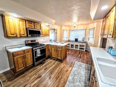 Beautiful, spacious home located at the 7th and 8th hole of on Desert Hawk At Pueblo West in Colorado - for sale on GolfHomes.com, golf home, golf lot