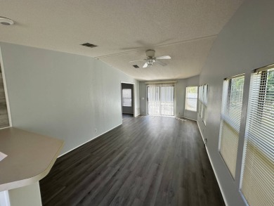Beautifully renovated 2 bedroom, 2 bathroom home.  The home is on Del Tura Golf and Country Club in Florida - for sale on GolfHomes.com, golf home, golf lot