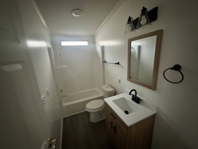 Beautifully renovated 2 bedroom, 2 bathroom home.  The home is on Del Tura Golf and Country Club in Florida - for sale on GolfHomes.com, golf home, golf lot