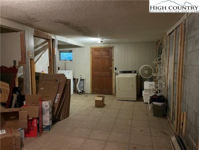 Located in the highly sought-after Linville Land Harbor, this on Land Harbor Golf Course in North Carolina - for sale on GolfHomes.com, golf home, golf lot