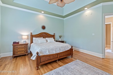 Pictures do not do this stunning home justice. Nestled in the on Members Club At St. James Plantation in North Carolina - for sale on GolfHomes.com, golf home, golf lot