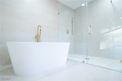 Step inside this freshly remodeled 3-bed, 2-bath pool home with on The Forest Country Club in Florida - for sale on GolfHomes.com, golf home, golf lot