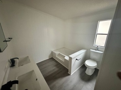 Beautifully renovated 2 bedroom, 2 bathroom home.  The home is on Del Tura Golf and Country Club in Florida - for sale on GolfHomes.com, golf home, golf lot